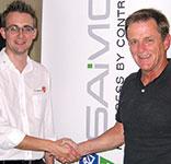 Howard Lister (right) thanks Freddie after the presentation.